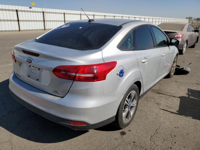 Photo 4 from auction – 2018 FORD FOCUS SE with VIN 1FADP3FEXJL217773