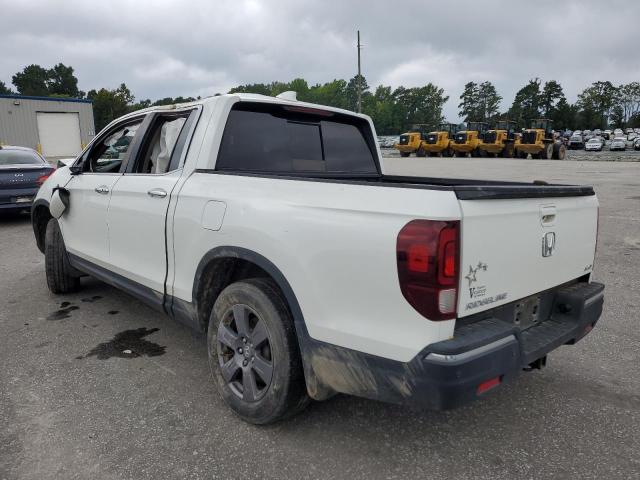 Photo 3 from auction – 2020 HONDA RIDGELINE with VIN 5FPYK3F74LB006173