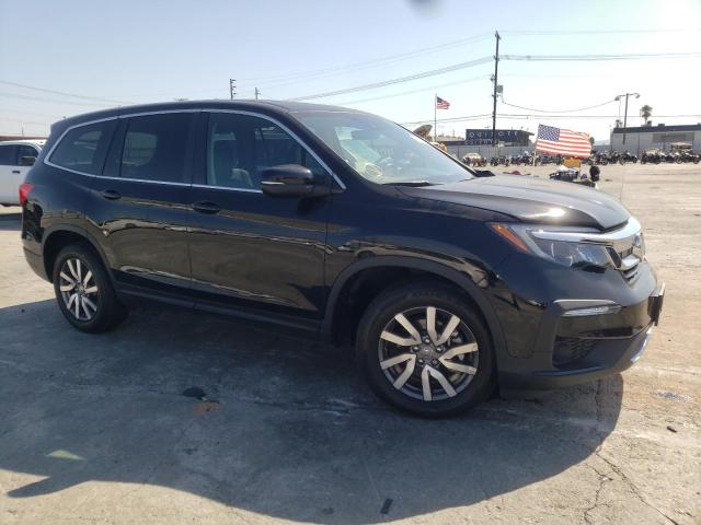 HONDA PILOT EXL 2021 with VIN 5FNYF5H55MB007290 - Photo from auction