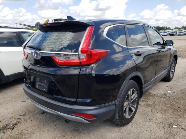 Photo 4 from auction – 2017 HONDA CR-V LX with VIN 7FARW5H37HE006090