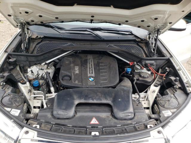 Photo 7 from auction – 2014 BMW X5 XDRIVE3 with VIN 5UXKS4C5XE0J93765