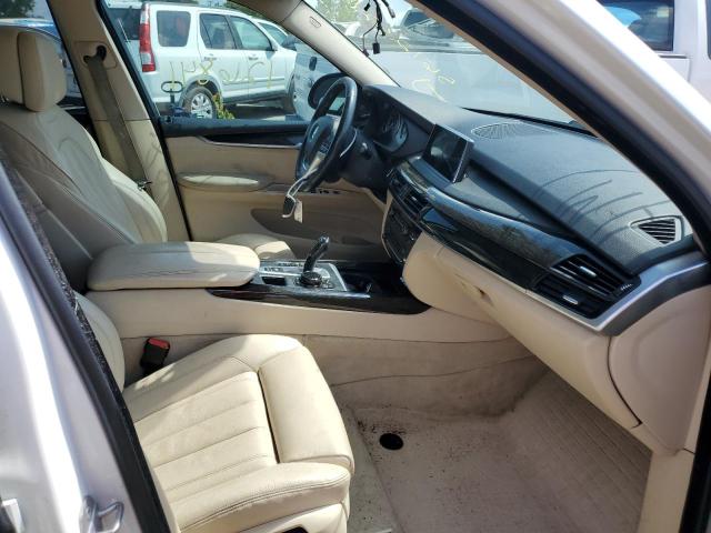 Photo 5 from auction – 2014 BMW X5 XDRIVE5 with VIN 5UXKR6C56E0C03055