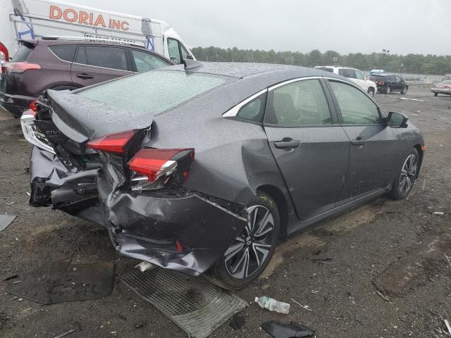 Photo 4 from auction – 2018 HONDA CIVIC EX with VIN JHMFC1F32JX000758