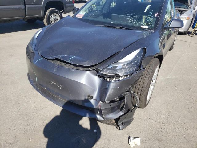 Photo 9 from auction – 2022 TESLA MODEL 3 with VIN 5YJ3E1EAXNF143827