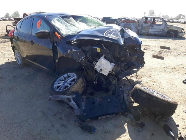 FORD FOCUS SE 2018 with VIN 1FADP3K21JL211873 - Photo from auction