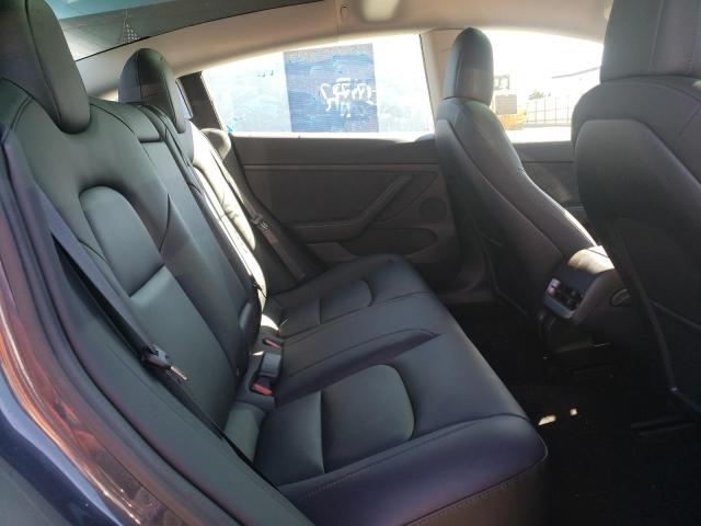 Photo 6 from auction – 2022 TESLA MODEL 3 with VIN 5YJ3E1EAXNF143827