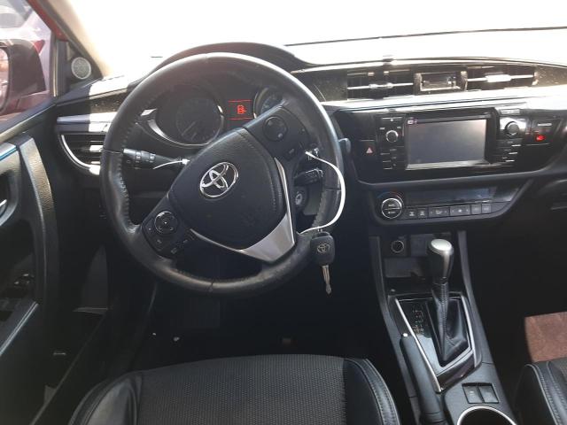 Photo 9 from auction – 2014 TOYOTA COROLLA L with VIN 5YFBURHE4EP165340