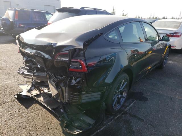 Photo 4 from auction – 2022 TESLA MODEL 3 with VIN 5YJ3E1EA9NF290060