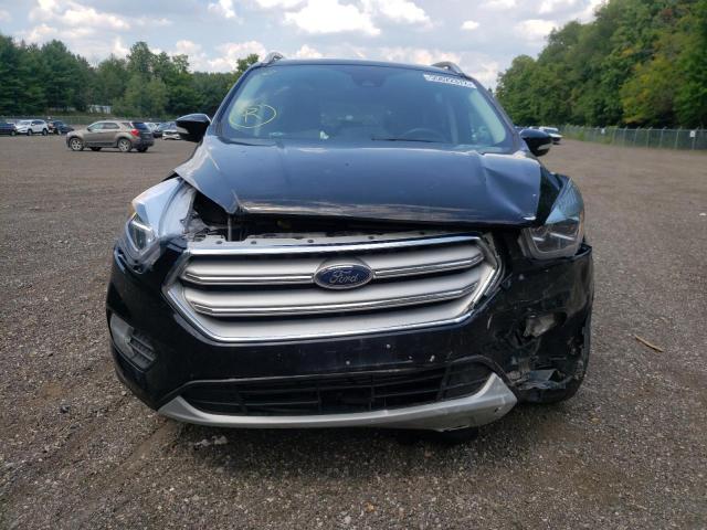 Photo 9 from auction – 2018 FORD ESCAPE TIT with VIN 1FMCU9J98JUD10972