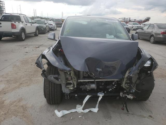 Photo 9 from auction – 2021 TESLA MODEL Y with VIN 5YJYGDEE3MF278912