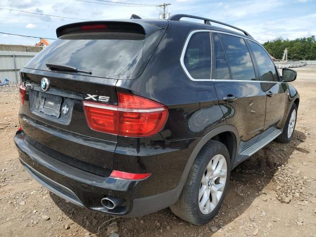 Photo 4 from auction – 2013 BMW X5 with VIN 5UXZV4C50D0G56827