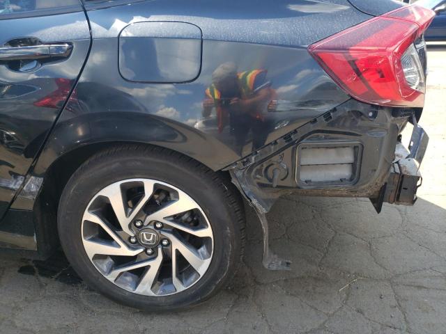 Photo 9 from auction – 2017 HONDA CIVIC EX with VIN 2HGFC2F78HH562268