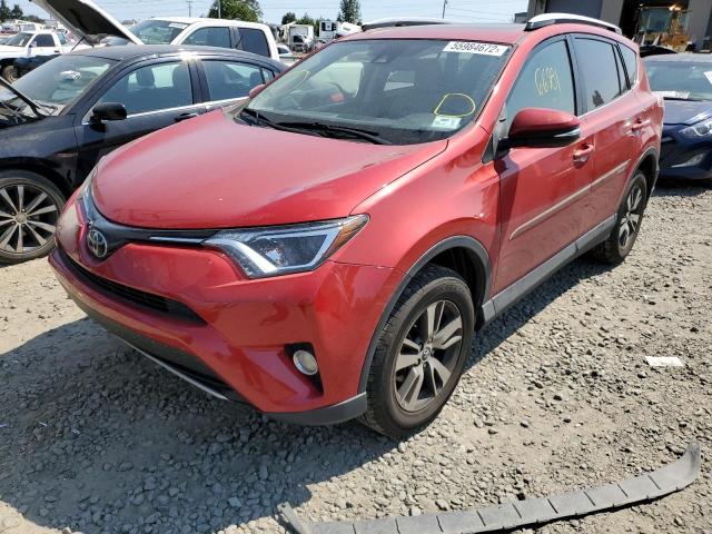 Photo 2 from auction – 2017 TOYOTA RAV4 XLE with VIN JTMWFREV4HJ128989
