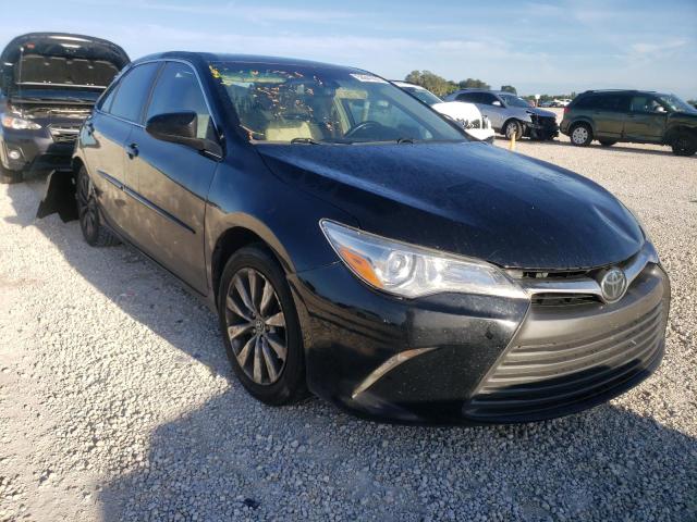 TOYOTA CAMRY LE 2016 with VIN 4T1BF1FK8GU584569 - Photo from auction