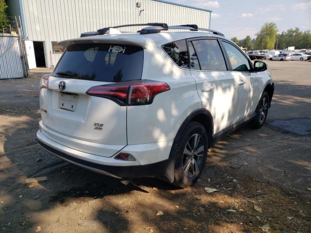 Photo 4 from auction – 2017 TOYOTA RAV4 XLE with VIN 2T3RFREV4HW669510