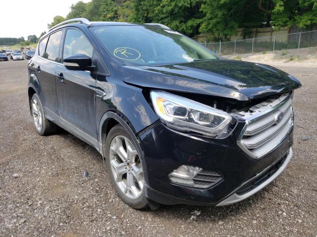 FORD ESCAPE TIT 2018 with VIN 1FMCU9J98JUD10972 - Photo from auction