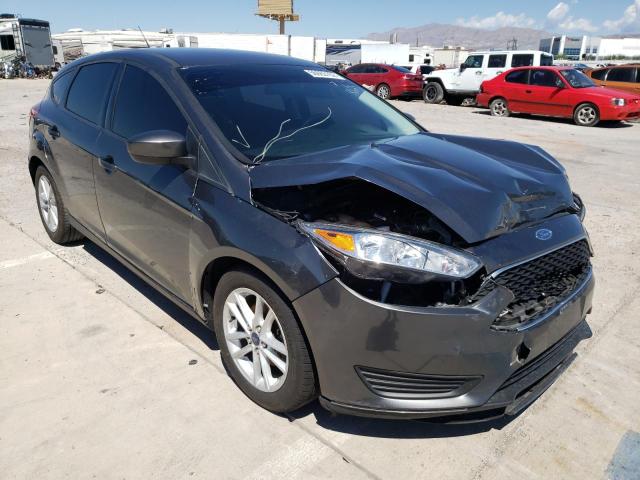 FORD FOCUS SE 2018 with VIN 1FADP3K22JL287554 - Photo from auction