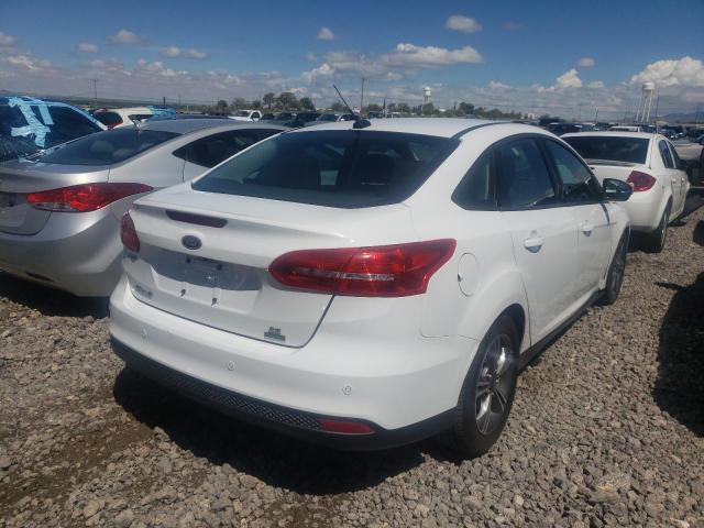 Photo 4 from auction – 2016 FORD FOCUS SE with VIN 1FADP3FE5GL258076