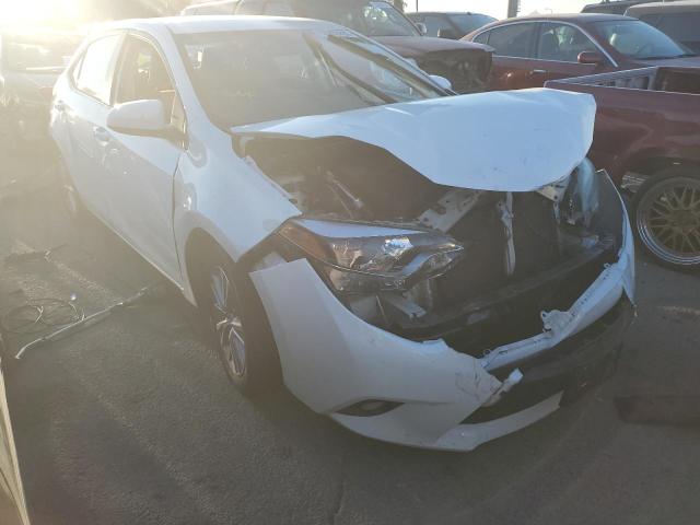 TOYOTA COROLLA L 2014 with VIN 5YFBURHE1EP091357 - Photo from auction