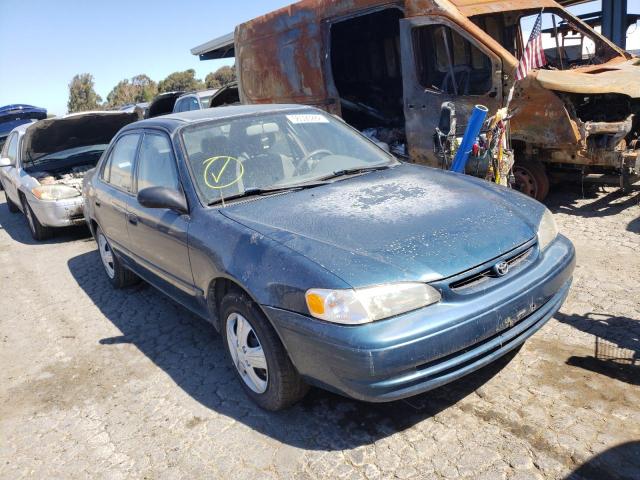 TOYOTA COROLLA 1999 with VIN 1NXBR12E3XZ235083 - Photo from auction