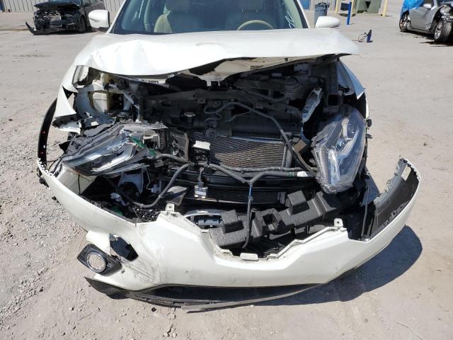 Photo 9 from auction – 2015 NISSAN ROGUE S with VIN 5N1AT2MTXFC854086