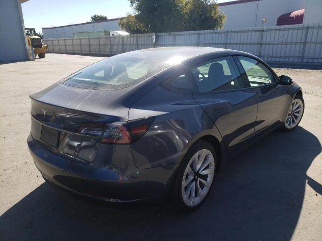 Photo 4 from auction – 2022 TESLA MODEL 3 with VIN 5YJ3E1EAXNF143827