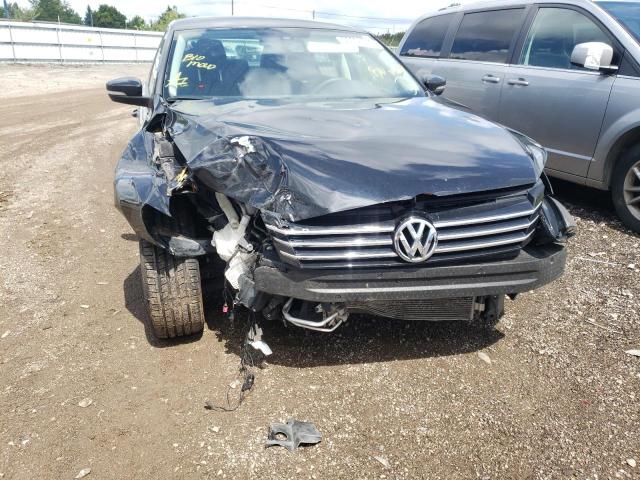 Photo 9 from auction – 2014 VOLKSWAGEN PASSAT S with VIN 1VWAS7A33EC034050