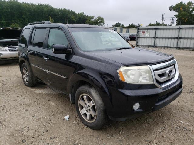 HONDA PILOT TOUR 2009 with VIN 5FNYF48979B027951 - Photo from auction
