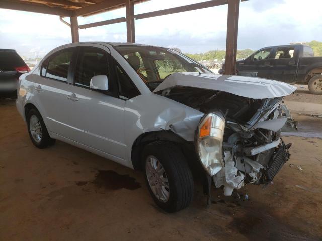 SUZUKI SX4 LE 2012 with VIN JS2YC5A33C6304611 - Photo from auction
