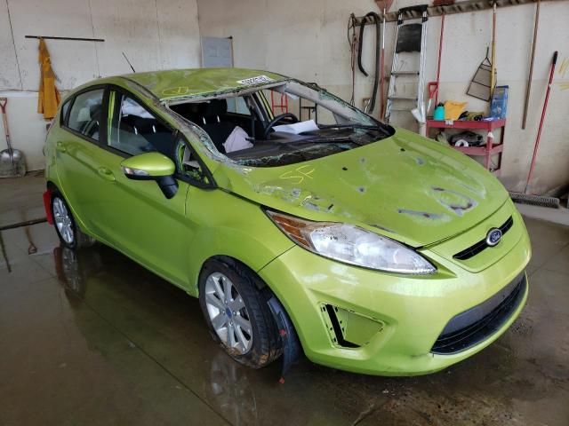 FORD FIESTA SE 2013 with VIN 3FADP4EJ7DM116665 - Photo from auction