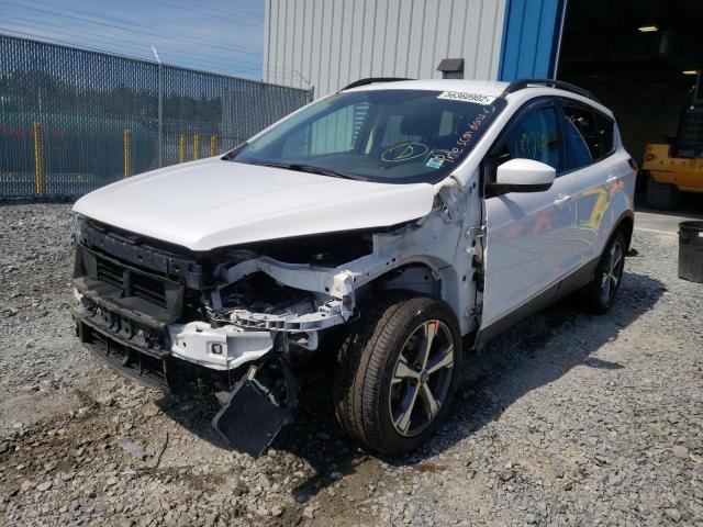 Photo 2 from auction – 2017 FORD ESCAPE SE with VIN 1FMCU9GD5HUB69560