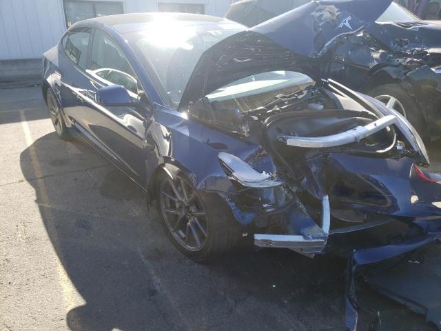 TESLA MODEL 3 2021 with VIN 5YJ3E1EB1MF876887 - Photo from auction