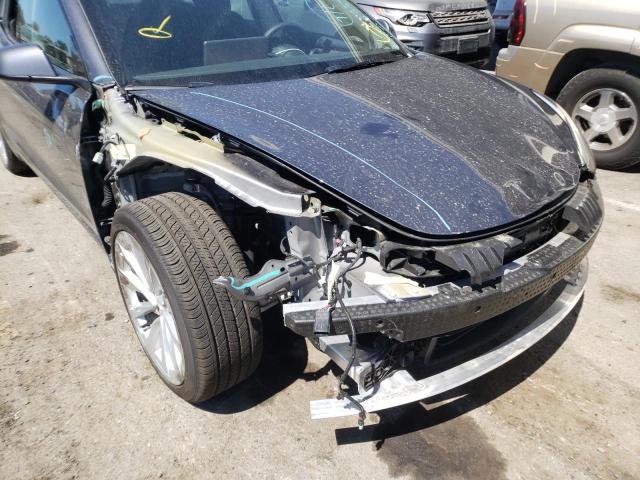 Photo 9 from auction – 2022 TESLA MODEL 3 with VIN 5YJ3E1EA9NF144564