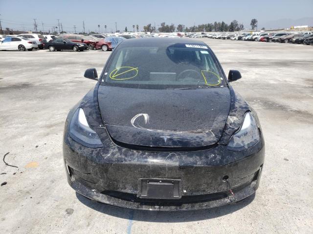 Photo 9 from auction – 2022 TESLA MODEL 3 with VIN 5YJ3E1EA8NF190516