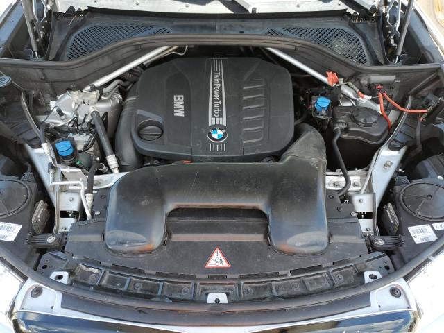 Photo 7 from auction – 2014 BMW X5 XDRIVE3 with VIN 5UXKS4C5XE0J94057