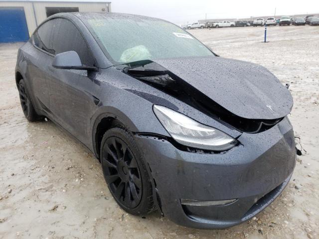 TESLA MODEL Y 2022 with VIN 7SAYGDEE9NA002123 - Photo from auction