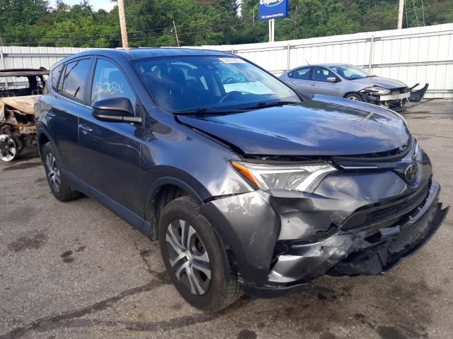 TOYOTA RAV4 LE 2018 with VIN 2T3ZFREV8JW473365 - Photo from auction