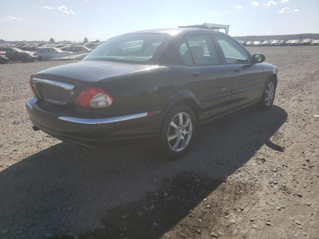 Photo 4 from auction – 2004 JAGUAR X-TYPE with VIN SAJEB52D74XE09255
