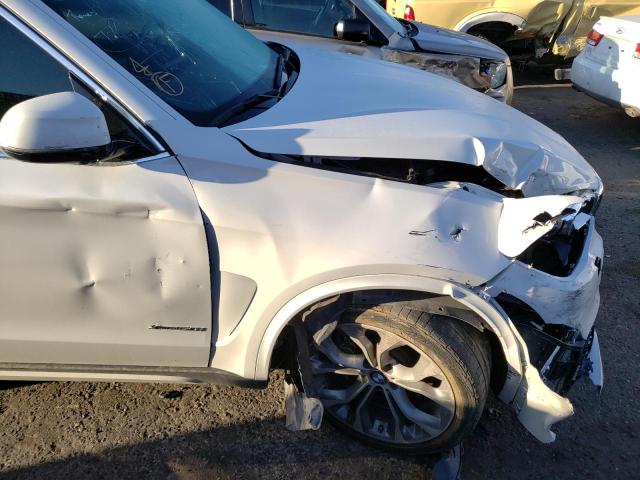 Photo 9 from auction – 2014 BMW X5 XDRIVE5 with VIN 5UXKR6C54E0J71879