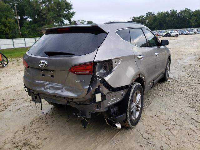 Photo 4 from auction – 2018 HYUNDAI SANTA FE S with VIN 5NMZU3LB8JH100925