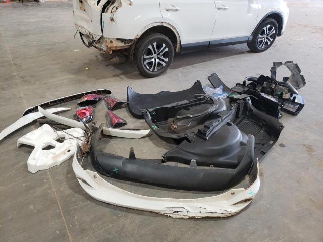 Photo 9 from auction – 2018 TOYOTA RAV4 LE with VIN JTMZFREV6JJ153069
