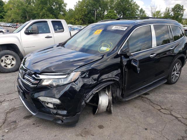 Photo 9 from auction – 2017 HONDA PILOT TOUR with VIN 5FNYF6H90HB063703
