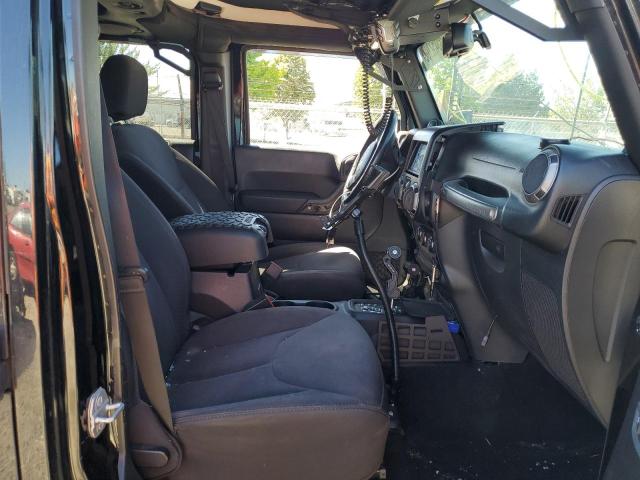 Photo 5 from auction – 2014 JEEP WRANGLER U with VIN 1C4BJWDG8EL243853