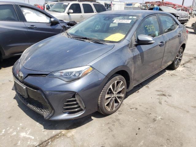 Photo 2 from auction – 2017 TOYOTA COROLLA L with VIN 5YFBURHE2HP709029