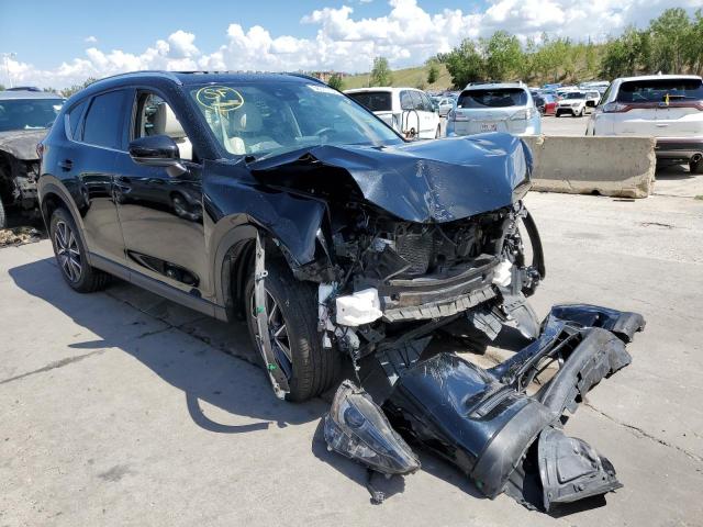 MAZDA CX-5 2018 with VIN JM3KFADMXJ0394464 - Photo from auction