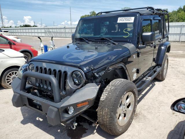 Photo 2 from auction – 2014 JEEP WRANGLER U with VIN 1C4BJWDG2EL235151