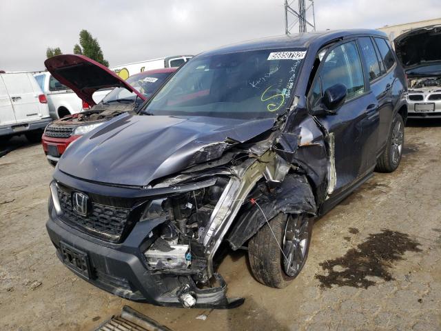 Photo 2 from auction – 2021 HONDA PASSPORT E with VIN 5FNYF8H57MB022164