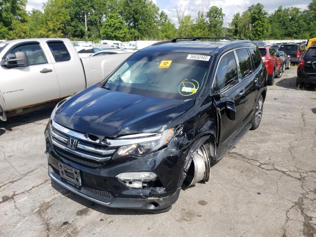 Photo 2 from auction – 2017 HONDA PILOT TOUR with VIN 5FNYF6H90HB063703