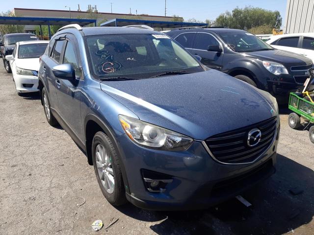 MAZDA CX-5 TOURI 2016 with VIN JM3KE4CY4G0617695 - Photo from auction