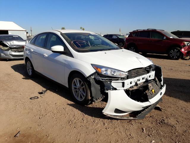 FORD FOCUS SE 2018 with VIN 1FADP3FEXJL235755 - Photo from auction